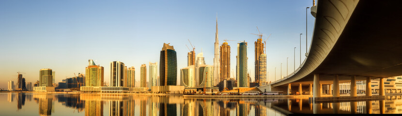 Fototapeta na wymiar Panoramic view of Business bay and downtown area of Dubai at sunrise, UAE