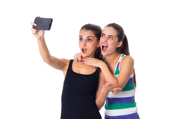 Fototapeta na wymiar Two young women making selfie