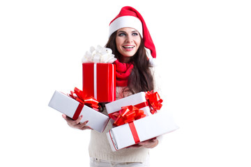 Smiling woman in santa helper hat with many gift boxes.