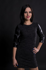 young girl in a black dress