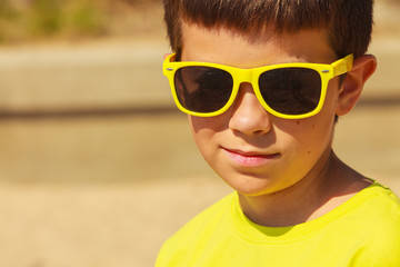 Portrait of boy outdoor in summer time.