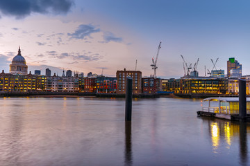 Fototapeta na wymiar Night skyline of city of London and Thames river, England, Great Britain