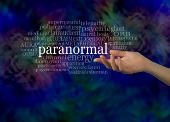 Aspect of the Paranormal - female hand gesturing towards the word PARANORMAL surrounded by a...