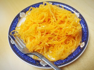 Sweet egg floss on blue dish and wood background