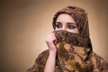 Young woman in traditional muslim clothing