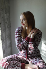 Red Haired Woman in Christmas Pajamas