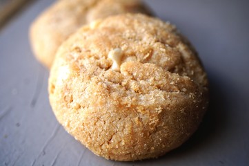 Two round peanut butter cookies
