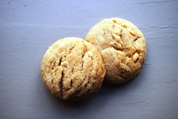 Two round peanut butter cookies