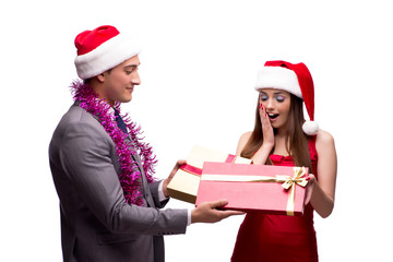 Pair celebrating christmas in the office isolated on white