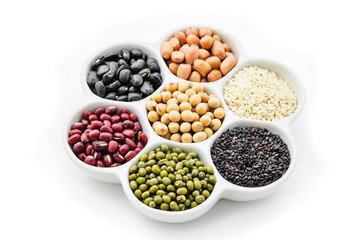 A variety of nuts in a cup.