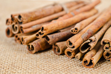 Cinnamon sticks on sack.