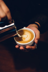 Fototapeta na wymiar coffee latte art in coffee shop