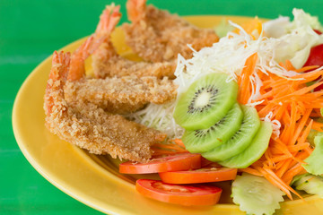 fried breaded prawn Milanese with Salad