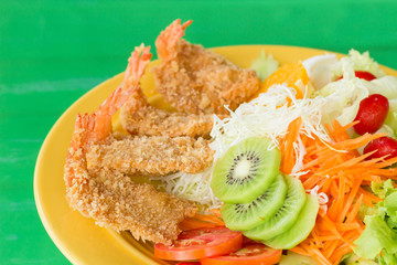 fried breaded prawn Milanese with Salad