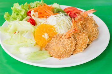 fried breaded prawn Milanese with Salad