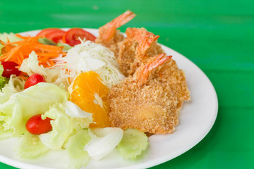 fried breaded prawn Milanese with Salad