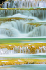 Layer of  waterfall, natural concept;selective focus with blur foreground and background.