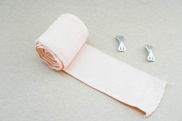 isolated bandage and gauze roll with bandage strip