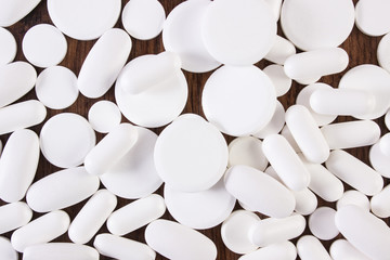 White medical pills and capsules, health care concept