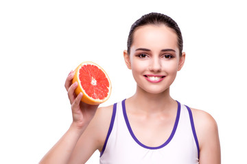 Woman with grapefruit isolated on white