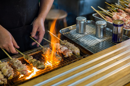 Yakitori Chicken Stand In Japan At Street Food Vendor Market, Grilled Satay. Japanese Food.