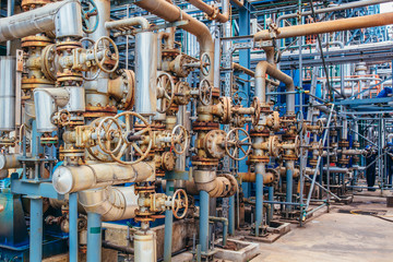 Industrial zone,The equipment of oil refining,Close-up of industrial pipelines of an oil-refinery...