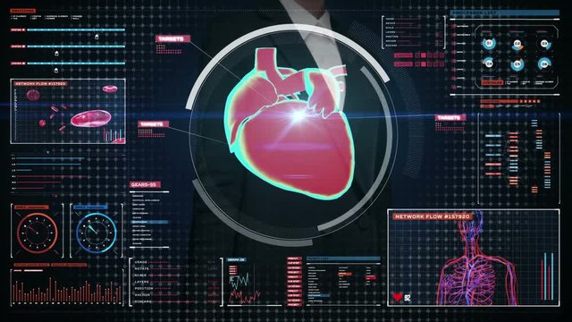 Businesswoman touching digital screen, scanning heart. Human cardiovascular system. medical technology.