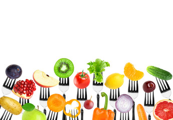 Fruits and vegetables on fork