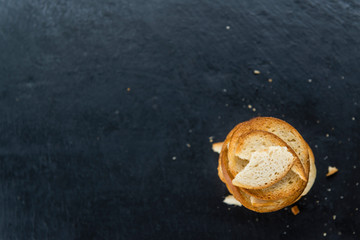Bread chips on a slate slab
