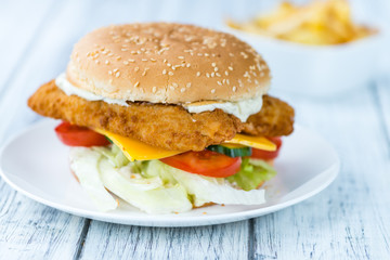Fish Burger on wooden background
