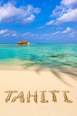 Fototapeta premium Word Tahiti on beach