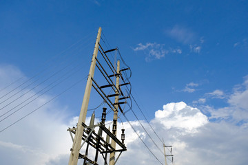 Transmission lines,electricity post with blue sky