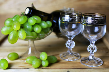 wine bottle book and glass grape