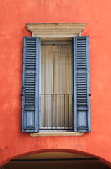 Fototapeta na wymiar Colourful ancient squared window