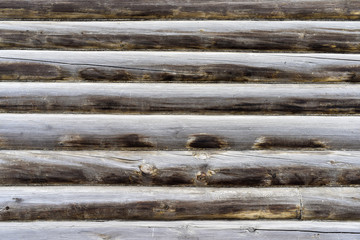 Part of log wall old residential house