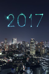 2017 Happy New Year Fireworks over Tokyo cityscape at night, Jap