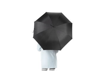 Women stand backwards with black blank umbrella opened mockup, clipping path. Female person hold...