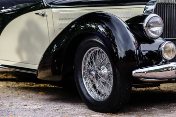 Obraz na płótnie Canvas Beautiful retro car. Elegance and style of first part of XX cen