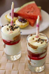 Sweet dessert, cake, watermelon slices on wicker napkin