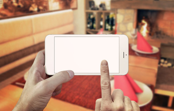 Read mobile phone app. Isolated display for mockup. Phone in hands, horizontal position.