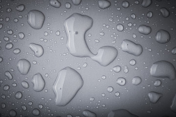 Drops of water on a color background. Toned