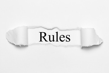Rules on white torn paper