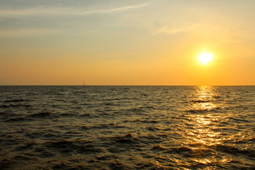 Fototapeta premium Sunset over sea water.