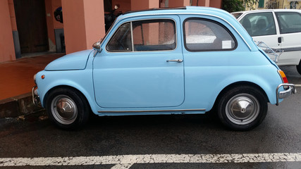 Fototapeta na wymiar Vintage Small Blue Car