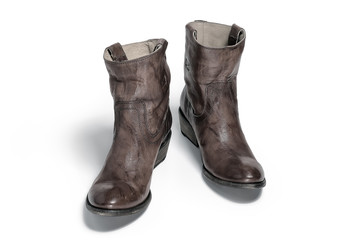 Pair of traditional cowboy boots retro tone