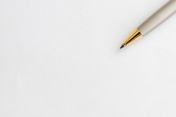 A pen on white paper.