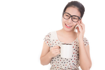 woman talking on a mobile phone and hold coffee cup. break time