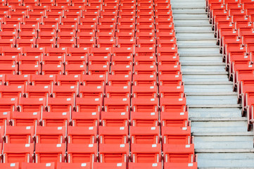 Empty orange seats at stadium,Rows of seat on a soccer stadium