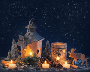 Burning lantern and christmas decoration