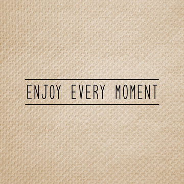 Enjoy every moment on brown tissue paper